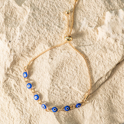 Beaded Brass Bracelet with Blue Evil Eyes